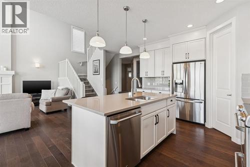 101 Cranarch Common Se, Calgary, AB - Indoor Photo Showing Kitchen With Double Sink With Upgraded Kitchen