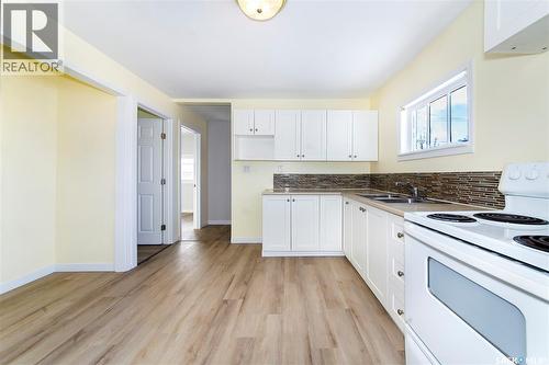 919 23Rd Street W, Saskatoon, SK - Indoor Photo Showing Kitchen With Double Sink