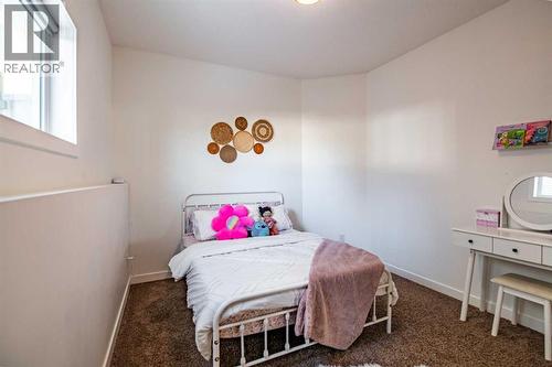 Basement Bedroom 3 - 53 Portway Close, Blackfalds, AB - Indoor Photo Showing Bedroom