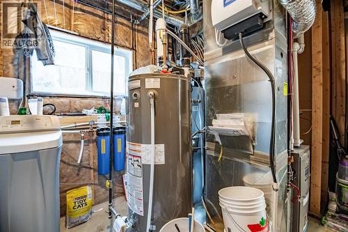 Utility Room/Water Softener - 53 Portway Close, Blackfalds, AB - Indoor Photo Showing Basement