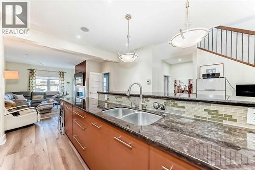 2810 25A Street Sw, Calgary, AB - Indoor Photo Showing Kitchen With Double Sink