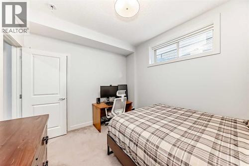 743 Shawnee Drive Sw, Calgary, AB - Indoor Photo Showing Bedroom