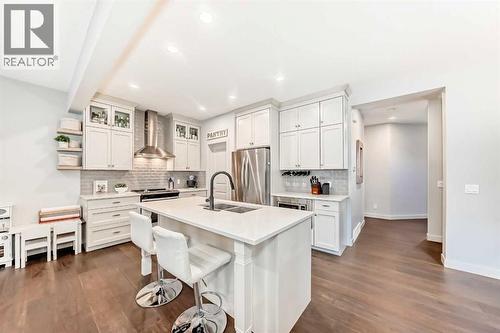 743 Shawnee Drive Sw, Calgary, AB - Indoor Photo Showing Kitchen With Double Sink With Upgraded Kitchen