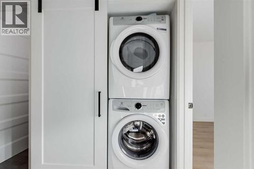 352 Abinger Crescent Ne, Calgary, AB - Indoor Photo Showing Laundry Room
