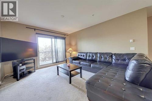 242, 52 Cranfield Link Se, Calgary, AB - Indoor Photo Showing Living Room