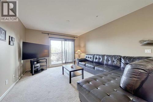 242, 52 Cranfield Link Se, Calgary, AB - Indoor Photo Showing Living Room