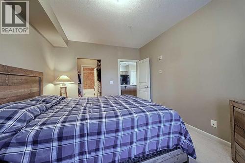 242, 52 Cranfield Link Se, Calgary, AB - Indoor Photo Showing Bedroom