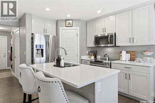 1025 Kolynchuk Crescent, Saskatoon, SK - Indoor Photo Showing Kitchen With Double Sink With Upgraded Kitchen