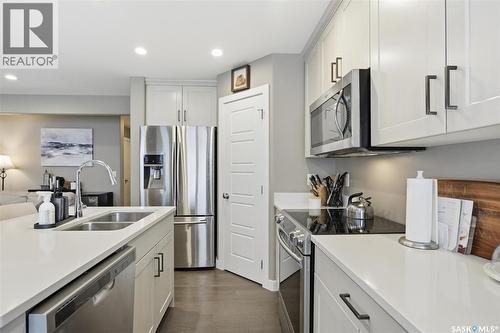 1025 Kolynchuk Crescent, Saskatoon, SK - Indoor Photo Showing Kitchen With Double Sink