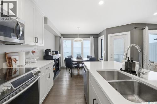 1025 Kolynchuk Crescent, Saskatoon, SK - Indoor Photo Showing Kitchen With Double Sink With Upgraded Kitchen