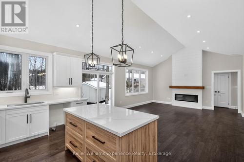 62 Rue Vanier, Tiny, ON - Indoor With Fireplace