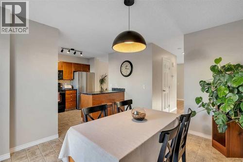 86 Eversyde Common Sw, Calgary, AB - Indoor Photo Showing Dining Room