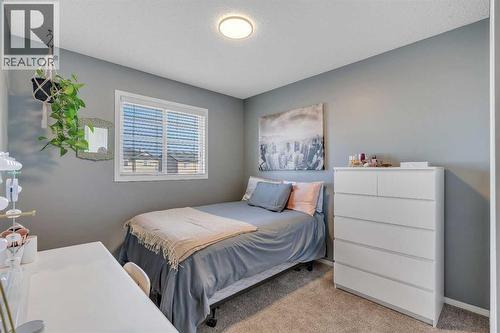 86 Eversyde Common Sw, Calgary, AB - Indoor Photo Showing Bedroom