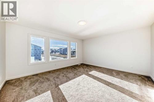 63 Creekside Path Sw, Calgary, AB - Indoor Photo Showing Other Room