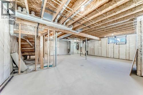 63 Creekside Path Sw, Calgary, AB - Indoor Photo Showing Basement