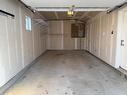 404 25 Tim Sale Drive, Winnipeg, MB  - Indoor Photo Showing Garage 