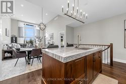 A floor to ceiling window and vaulted ceiling - 