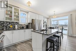 Walkout to deck, stainless steel appliances - 