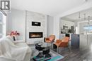 306 Brighton Boulevard, Saskatoon, SK  - Indoor Photo Showing Living Room With Fireplace 