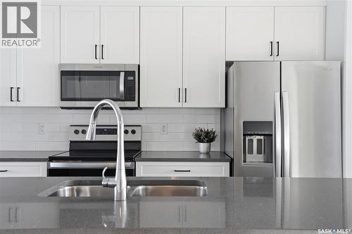 306 Brighton Boulevard, Saskatoon, SK - Indoor Photo Showing Kitchen With Double Sink With Upgraded Kitchen