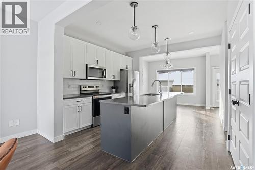 306 Brighton Boulevard, Saskatoon, SK - Indoor Photo Showing Kitchen With Upgraded Kitchen
