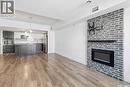 418 C Avenue S, Saskatoon, SK  - Indoor Photo Showing Other Room With Fireplace 