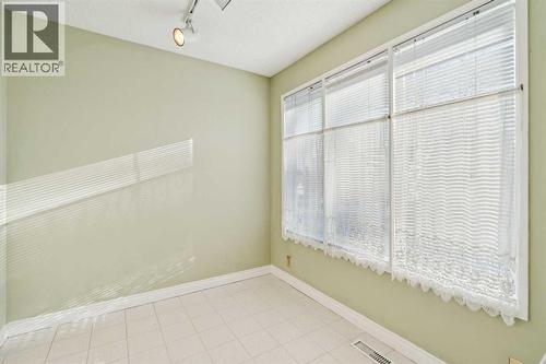 308 Woodvale Crescent Sw, Calgary, AB - Indoor Photo Showing Other Room