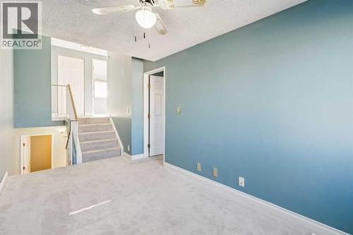 308 Woodvale Crescent Sw, Calgary, AB - Indoor Photo Showing Other Room