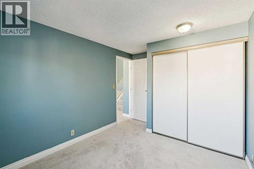 308 Woodvale Crescent Sw, Calgary, AB - Indoor Photo Showing Other Room