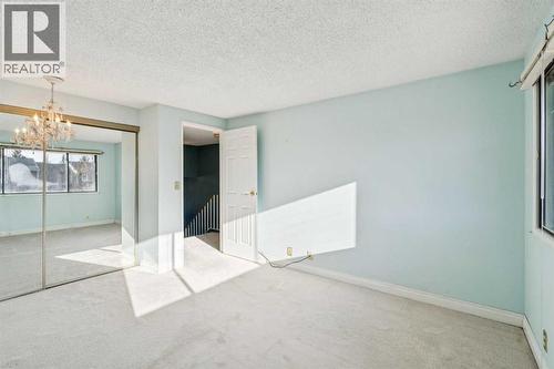 308 Woodvale Crescent Sw, Calgary, AB - Indoor Photo Showing Other Room
