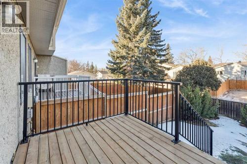 308 Woodvale Crescent Sw, Calgary, AB - Outdoor With Deck Patio Veranda With Exterior