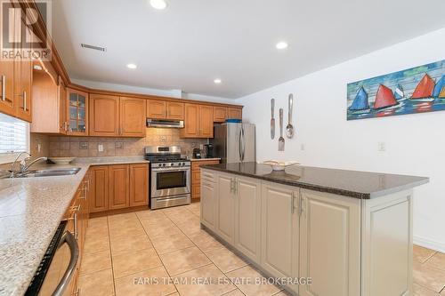 100 Desroches Trail, Tiny, ON - Indoor Photo Showing Kitchen With Double Sink