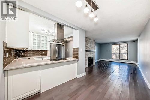 604, 537 14 Avenue Sw, Calgary, AB - Indoor With Fireplace