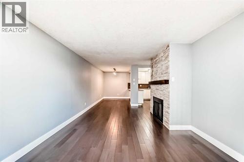 604, 537 14 Avenue Sw, Calgary, AB - Indoor With Fireplace