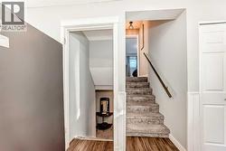 Stairs going up and down in this 3-level split - 