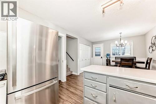 New stainless steel appliances (with transferable warranty), await your enjoyment! - 7840 20A Street Se, Calgary, AB - Indoor Photo Showing Kitchen