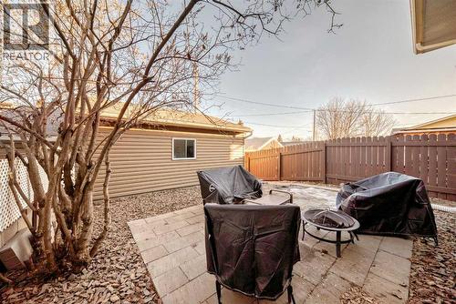 Freshly landscaped backyard - 7840 20A Street Se, Calgary, AB - Outdoor With Deck Patio Veranda