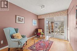 Patio door leading to solarium and yard. - 