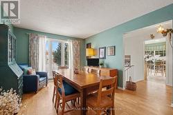 Grand space currently used as dining room. - 