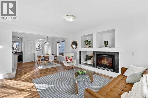 109 Copperstone Grove Se, Calgary, AB - Indoor Photo Showing Living Room With Fireplace