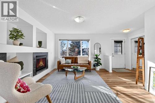 109 Copperstone Grove Se, Calgary, AB - Indoor Photo Showing Living Room With Fireplace