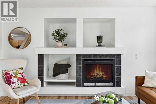 109 Copperstone Grove Se, Calgary, AB - Indoor Photo Showing Living Room With Fireplace