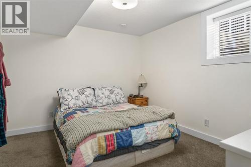 17 Aster Place Se, Airdrie, AB - Indoor Photo Showing Bedroom
