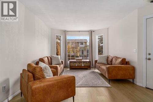 17 Aster Place Se, Airdrie, AB - Indoor Photo Showing Living Room