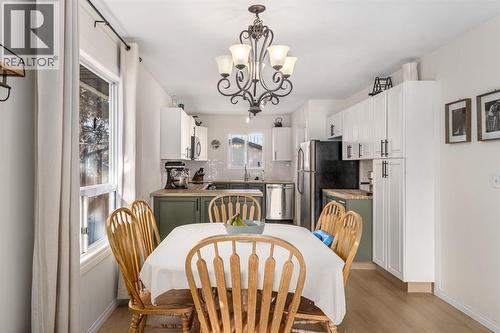 17 Aster Place Se, Airdrie, AB - Indoor Photo Showing Dining Room