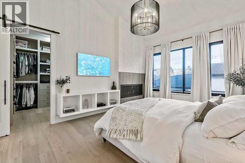 56 Lissington Drive Sw, Calgary, AB - Indoor Photo Showing Bedroom
