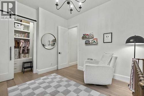 56 Lissington Drive Sw, Calgary, AB - Indoor Photo Showing Other Room