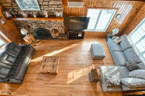 Mezzanine - 10 Av. David, Saint-Sauveur, QC - Indoor Photo Showing Living Room With Fireplace