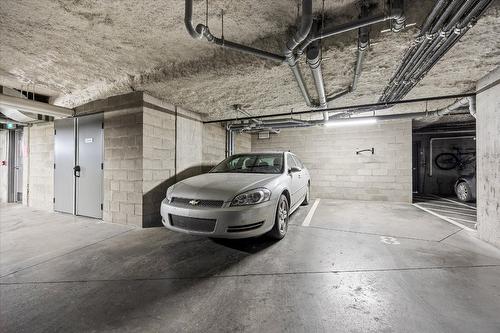 212-655 Academy Way, Kelowna, BC - Indoor Photo Showing Garage