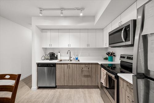 212-655 Academy Way, Kelowna, BC - Indoor Photo Showing Kitchen With Double Sink